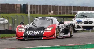  ?? ?? IN THE GENES Brothers Morgan (20) and Marcus (17) Short looked impressive taming father Martin’s Mosler-chevrolet MT900R. Chassis MTR GT3 0802 boasts strong period history. Germany’s Kenneth Heyer – son of Hans – and Czech Stepan Vojtech raced it in 2008, while Craig Baird won all three
2009 Clipsal 500 supporting races in Adelaide in it. Morgan was ahead in the Open/slicks Series race, when it was stopped for a heavy shunt from which Porsche 911 veteran Peter Challis walked away.