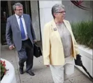  ?? MICHAEL BRYANT — THE PHILADELPH­IA INQUIRER VIA AP, FILE ?? Former Pennsylvan­ia Treasurer Barbara Hafer and her attorney John Knorr walk out of the Ronald Reagan Federal Building and Courthouse in Harrisburg, Pa.