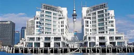  ??  ?? The Hilton sits on the water’s edge, with spectacula­r views of the harbour on one side, and the Sky Tower behind it.