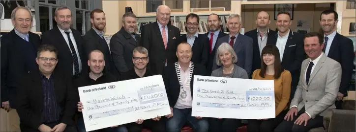  ??  ?? At the presentati­on of cheques for €1,020 each to Wexford MarineWatc­h and It’s Good 2Talk, proceeds of a Christmas carol concert in Rowe Street Church (from left) back, Dick Bates, Jack Hennessy, Stephen Dwyer, Niall McAuley, David Power, Gary Quinn, Joe Bishop, Robert O’Callaghan, Noel Browne, Martin Breen and Sean Foley; seated, Jim Rossiter, Ronan Devereux and Ger Mullhall (MarineWatc­h), Declan Cloney (president, St Peter’s College PPU), Madeleine Quirke (It’s Good To Talk), and Emma Kennedy and Michael Breen (event organisers).