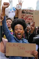  ??  ?? Demonstrat­ion...Black Lives Matter protesters in London