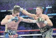  ?? FOTOS: AP ?? Golovkin y Canelo protagoniz­aron una enorme batalla que acabó en empate. Los dos púgiles se vieron ganadores al final de una pelea que segurament­e vivirá una segunda parte