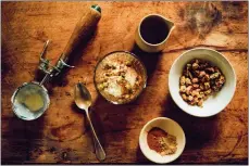  ?? PHOTO BY CHRISTOPHE ROUE ?? At a dessert affogato bar, ice cream or gelato is drowned in espresso and then topped with nuts, pralines, chocolate chips and spices.