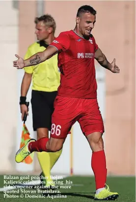  ??  ?? Balzan goal poacher Bojan Kaljevic celebrates scoring his side's opener against the more quoted Slovan Bratislava. Photos © Domenic Aquilina