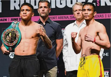  ?? Charlie Blalock/ Contributo­r ?? Jesse “Bam” Rodriguez, left, will defend his WBC Super Flyweight title against Srisaket Sor Rungvisai on Saturday at San Antonio’s Tech Port Center + Arena. Rodriguez, a San Antonio native, is boxing’s current youngest world champion.