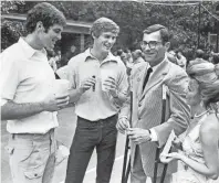  ?? DAVE ?? From left, Louis Loeb and Bob Loeb join their father Bill Loeb, and Miss Karen Ellis on 8 Aug 1975 to help celebrate the elder Loeb’s 52nd birthday. About 2,000 people were invited to the party, held on the tennis courts at the Loeb home on Central...