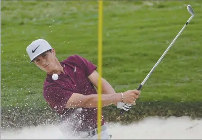  ?? The Associated Press ?? Thorbjorn Olesen of Denmark hits from the bunker on the 15th hole during the second round of the PGA Championsh­ip at the Quail Hollow Club in Charlotte, N.C., on Friday. Olesen was tied for first place after Thursday’s opening round, but fell off the...