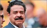  ?? DON WRIGHT/AP PHOTO ?? Jacksonvil­le owner Shahid Khan stands on the sidelines before of an Oct. 8, 2017 game against the Steelers in Pittsburgh. Kahn has made an offer to The English Football Associatio­n to buy London’s Wembley Stadium.