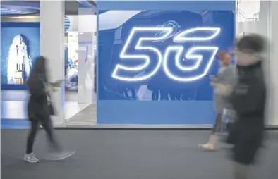  ?? JORDI COTRINA ?? Carteles de 5G en la última edición del Mobile World Congress de Barcelona.