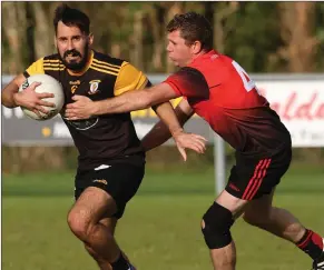  ?? ?? Ryan Hanna is challenged by brookeboro­ugh defender Michael Rice.