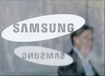  ?? ASSOCIATED PRESS ARCHIVES ?? Samsung also said that it plans to create 20,000 more jobs over the next three years, on top of a previously announced 20,000 new jobs.