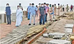  ?? — PTI ?? West Bengal Chief Minister Mamata Banerjee takes a stock of damages due to the landfall of Cyclone Yaas in Digha on Friday.