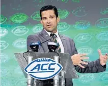  ?? CHUCK BURTON/AP ?? Hurricanes coach Manny Diaz talks to the media Thursday at the ACC Kickoff about upholding the standards set by previous Miami teams.