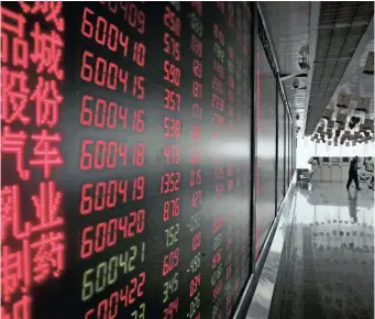  ??  ?? INVESTORS monitor stock prices at a brokerage house in Beijing. The writer argues that China is set to become the most powerful nation on Earth by 2030. He predicts that the Chinese economy will be bigger than that of the US by 2028 and twice as large by 2050.| ANDY WONG AP African News Agency (ANA) Archives