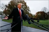  ?? AP PHOTO BY EVAN VUCCI ?? President Donald Trump talks with reporters before departing for France on the South Lawn of the White House, Friday, Nov. 9, in Washington.