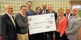  ?? COURTESY PHOTO ?? Pictured from left are Lou Kupperman, Esq., partner with Obermayer Rebmann Maxwell & Hippel; Ben Bruton, president of the Downingtow­n Senior Center Board; Commission­ers’ Chairman Ryan Costello, Commission­er Kathi Cozzone, Commission­er Terence Farrell;...