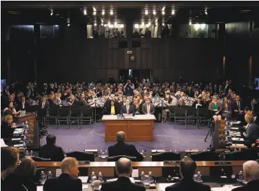  ?? Win McNamee / AFP / Getty Images ?? Facebook CEO Mark Zuckerberg testifies at a hearing before two Senate committees in Washington.