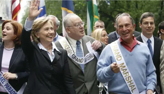  ?? AP FILE ?? NEW YORK STATE OF MIND: Then-Sen. Hillary Rodham Clinton, left, and then-New York City Mayor Michael Bloomberg, right, march in the Salute to Israel Day Parade in 2006.