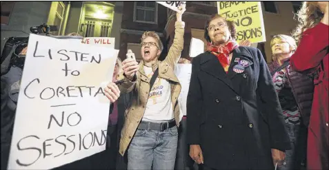  ?? GETTY IMAGES ?? Outside Senate Majority Leader Mitch McConnell’s house, protesters read aloud the 1986 letter from Coretta Scott King about Sessions that Sen. Elizabeth Warren, D-Mass., was prevented from reading on the Senate floor.