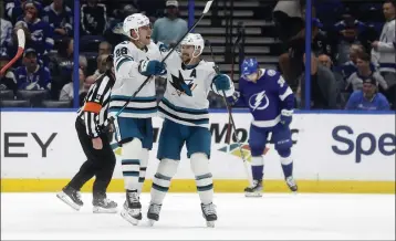  ?? MIKE EHRMANN — GETTY IMAGES ?? Timo Meier #28of the San Jose Sharks celebrates a goal in overtime during a game against the Tampa Bay Lightning at Amalie Arena on Feb. 7 in Tampa, Florida.