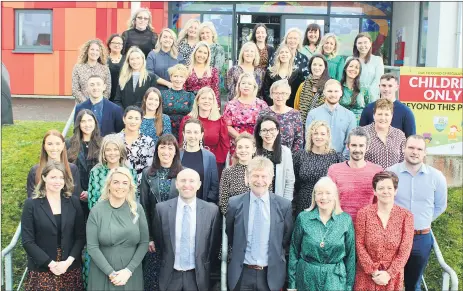  ?? ?? Watergrass­hill National School staff pictured outside the school with Mr O’Brien, wishing him well on his retirement.
