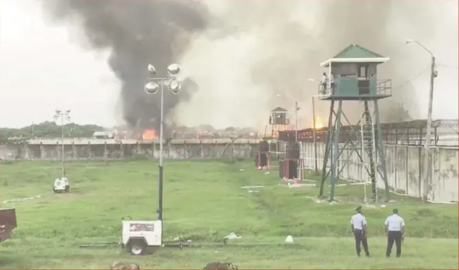  ??  ?? The Lusignan Prison dorm engulfed by fire.