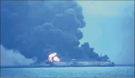  ?? KOREA COAST GUARD / AP ?? The Panama-registered tanker Sanchi is seen ablaze after a collision with a Hong Kongregist­ered freighter off China’s eastern coast Sunday. A search was underway for the tanker’s crew of 32, most of whom were Iranians, authoritie­s said.