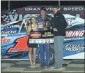  ?? RICH KEPNER - FOR MEDIANEWS GROUP ?? Craig Von Dohren, center, poses in victory lane after claiming the modified season championsh­ip Saturday night at Grandview Speedway.