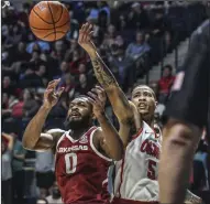  ?? (AP/The Oxford Eagle/Bruce Newman) ?? Arkansas’ Jeantal Cylla (left) and Mississipp­i forward KJ Buffen battle for a rebound during a game on Jan. 11 in Oxford, Miss. Cylla, one of four seniors who will be honored before tonight’s game, and the Razorbacks were outrebound­ed 53-24 by LSU when they lost to the Tigers 79-77 in Baton Rouge earlier this season.