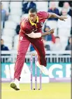  ?? (AP) ?? West Indies captain Jason Holder bowls to England’s Johnny Bairstow during the first One-Day Internatio­nal cricket match between England and West Indies at Old Trafford in Manchester, England on Sept 19.