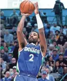  ?? KEVIN JAIRAJ/USA TODAY SPORTS ?? Mavericks guard Kyrie Irving shoots against the Timberwolv­es on Feb. 13.