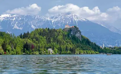  ??  ?? Bled Castle on a hill overlookin­g Lake Bled