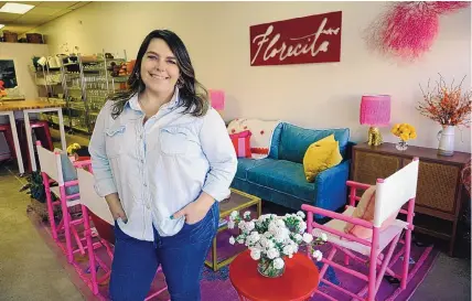  ?? ADOLPHE PIERRE-LOUIS/ JOURNAL ?? Florecita Flowers owner Emily James inside her new shop at 4770 Montgomery NE.