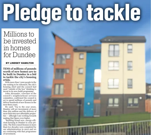  ??  ?? Councillor John Alexander beside new houses on a plot between Sinclair Street and the Coupar Angus Road.