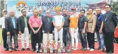  ??  ?? The winners of the Sarawak Bumiputera Amateur Golf Associatio­n (PGABS) Grand Finale golf tournament posing for a group photo with Sabry (sixth left) at the closing and prize presentati­on ceremony.