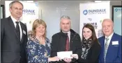  ??  ?? Rose and Katie Bailey St. Patrick’s Parish Soup Kitchen, receiving a cheque from Damien Rooney, Board of Directors.