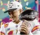  ?? AP ?? QB Patrick Mahomes holds the trophy after the Chiefs beat the Eagles in Super Bowl LVII.