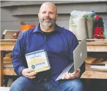  ?? NICK PROCAYLO ?? Rabbi Dan Moskovitz prepares with a laptop for a virtual seder in an attempt to prevent the spread of COVID-19.