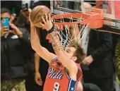  ?? PATRICK T. FALLON/GETTY-AFP ?? Mac McClung won the NBA dunk contest on Saturday night in Salt Lake City. Sunday’s All-Star Game ended too late for this edition.