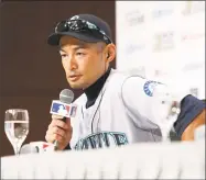  ?? Toru Takahashi / Associated Press ?? The Seattle Mariners’ Ichiro Suzuki speaks during a press conference in Tokyo Saturday. The Mariners will play in a two-game series against the Oakland Athletics to open the Major League season on March 20-21 at the Tokyo Dome.