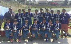  ??  ?? The El Centro Police Athletic League boys' soccer team, San Luis Under-15, smiles for a photo after competing in the Cal State Games on Saturday and Sunday in Chula Vista. PHOTO COURTESY OF PABLO NAVA