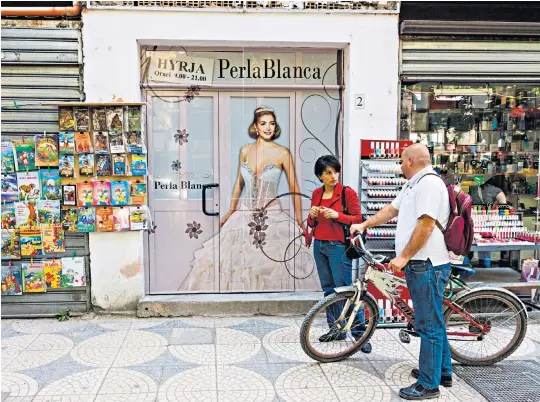  ?? ?? i Street life: Tirana, ‘where everything is cheap and walkable’; Suzanne outside BunkArt2 museum; and gin o’clocks at the Radio Bar