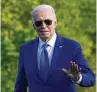  ?? SUSAN WALSH / AP ?? President Joe Biden waves as he walks across the South Lawn of the White House in Washington Tuesday.