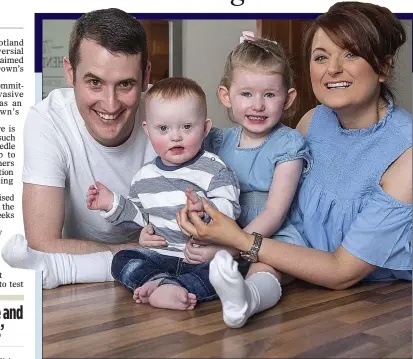  ??  ?? HAPPY FAMILY: Little Rory, who has Down’s syndrome, with mother Leigh, father Ryan and sister Molly, 3