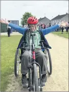  ?? (Pic: EOB-d) ?? Rory Burke enjoying the freedom of cycling on a specially adapted bicycle at the ‘Come and try a bike’ event in Fermoy.
