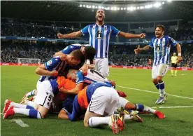  ?? ?? Real Sociedad's players celebrate after their last-minute winner to beat Mallorca. Photograph: Juan Herrero/EPA