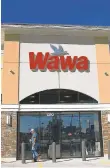  ?? DYLAN SLAGLE/ CARROLL COUNTY TIMES ?? Wawa is asking customers to pay with plastic, their phones or use exact change due to a nationwide coin shortage caused by the coronaviru­s pandemic.