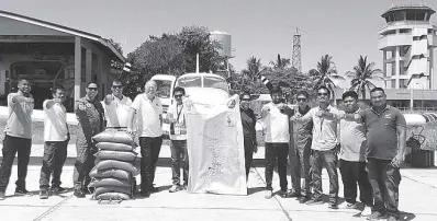  ??  ?? The Department of Agricultur­e-Region 2, together with the Bureau of Soils and Water Management, engaged the services of Pegasus Air to conduct cloud seeding operations to cushion the effect of El Niño in the provinces of Isabela.In photo are Pegasus Air Captains Luc Helgen, Ketan Gudadhe and Dave Enriguez and mechanic Jesse Moreno.