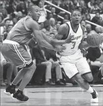  ?? Photo by Jonathan Newton / The Washington Post ?? Bradley Beal (3) and the Washington Wizards believe they can get more physical with Avery Bradley (left) and the Boston Celtics.