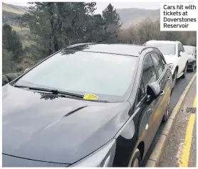  ??  ?? Cars hit with tickets at Doverstone­s Reservoir